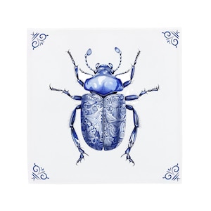 May include: A blue and white beetle with intricate patterns on its wings. The beetle is drawn in a detailed style, resembling a traditional blue and white porcelain design.
