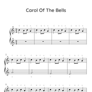Puede incluir: Partitura musical para el villancico navideño "Carol of the Bells". La música está escrita en clave de sol e incluye la letra de la canción. La partitura está impresa en papel blanco con tinta negra.