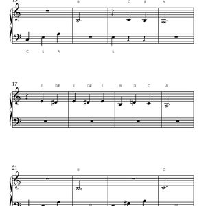 May include: A black and white musical score with treble and bass clefs. The notes are arranged on staves, with letter notations below each measure. The score includes the numbers 2, 13, 17, and 21.