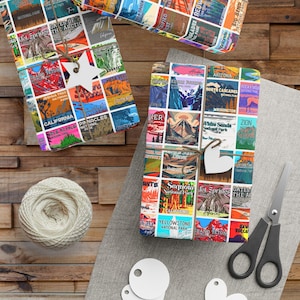 May include: A colorful wrapping paper design featuring vintage-style illustrations of national parks across the United States. The paper includes names of parks like Yellowstone, Grand Teton, Sequoia, and Zion.