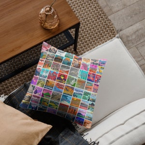 May include: A colorful throw pillow featuring a collage of vintage National Park Service posters. The pillow is made of a soft, comfortable fabric and is perfect for adding a touch of nature to any room.