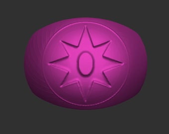 May include: A magenta ring with a central eight-pointed star design and an oval shape in the middle. The ring has a textured band and is set against a dark gray background.