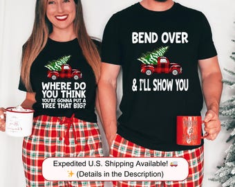 May include: Black t-shirts with matching red plaid pajama pants. One shirt says "Where do you think you're gonna put a tree that big?" and the other says "Bend over & I'll show you". Both shirts feature a red truck carrying a Christmas tree.