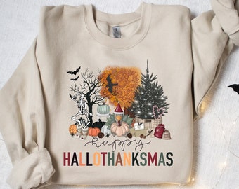 Può includere: Felpa beige con grafica colorata "happy HALLOTHANKSMAS". La grafica include uno scheletro, zucche, un albero di Natale e pipistrelli. Un capo stagionale e confortevole.