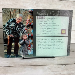 Personalized handwriting photo cutting board.  Loved ones hand written recipe with their photo on a glass cutting board.