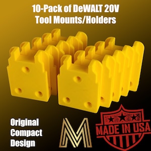 May include: Ten-pack of yellow plastic tool mounts for DeWALT 20V tools. The mounts are designed to be attached to a wall or other surface. The text "Original Compact Design" and "MADE IN USA" are visible in the image.