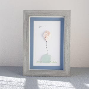 Shell Flower in a Sea Glass Vase Picture