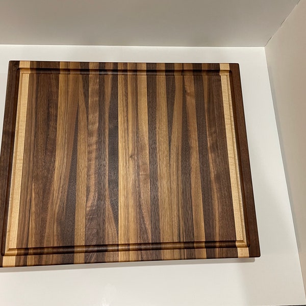 Walnut and Maple edge grain cutting board