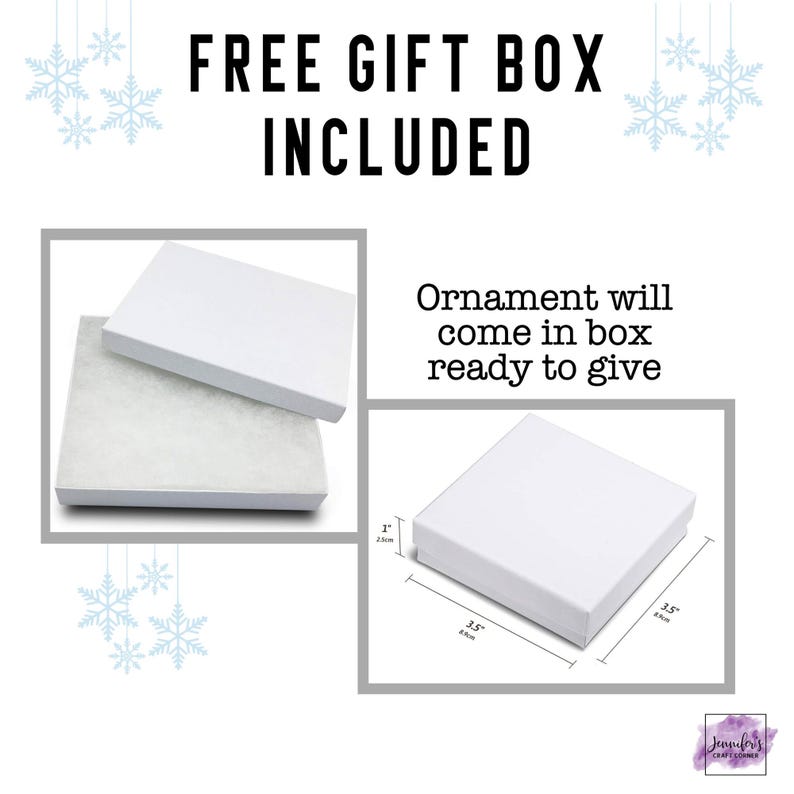 May include: White gift boxes, one open and one closed, with the text "FREE GIFT BOX INCLUDED." The text "Ornament will come in box ready to give" is also present. The boxes measure 3.5 inches by 3.5 inches.