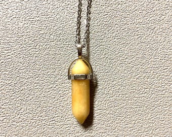 Yellow quartz pendant necklace on a chain