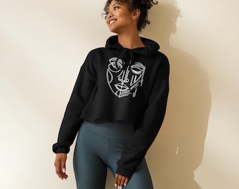 Cropped hoodie with an abstract hand-drawn One-Eyed Muse face design by Robert Anthony
