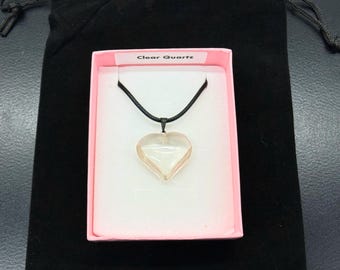 Clear quartz heart pendant necklace on a chain