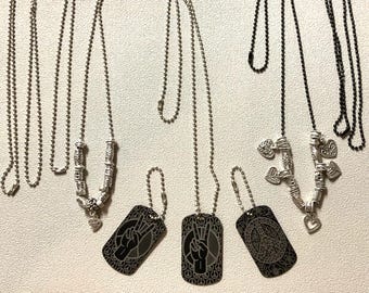 Peace and love themed gift set with three necklaces and two keychains