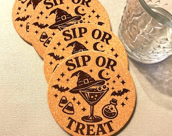 Set of four laser etched cork coasters with a Halloween Sip or Treat design and gift bag