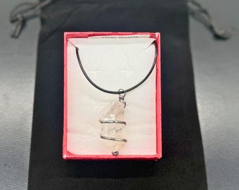 Clear quartz natural gemstone pendant on a chain