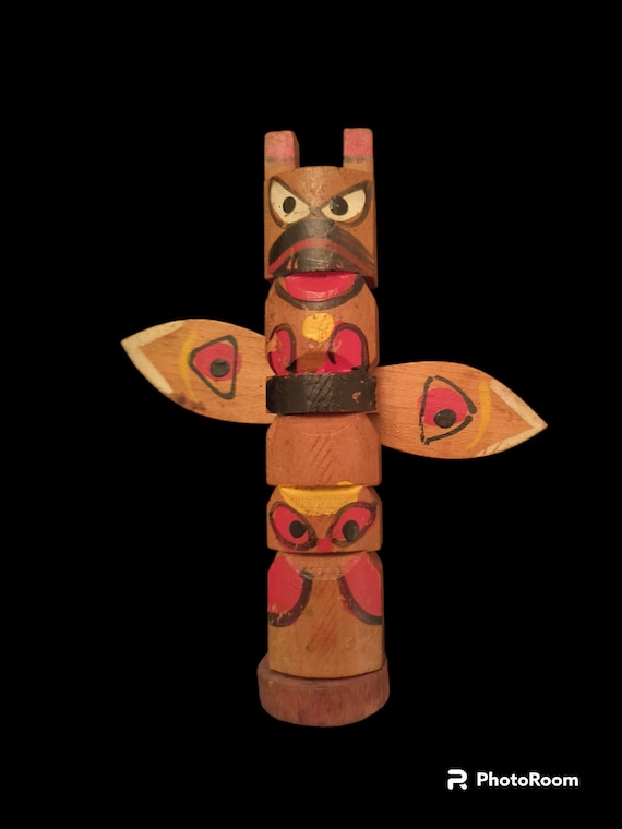Vintage little wood totem with rotating wings