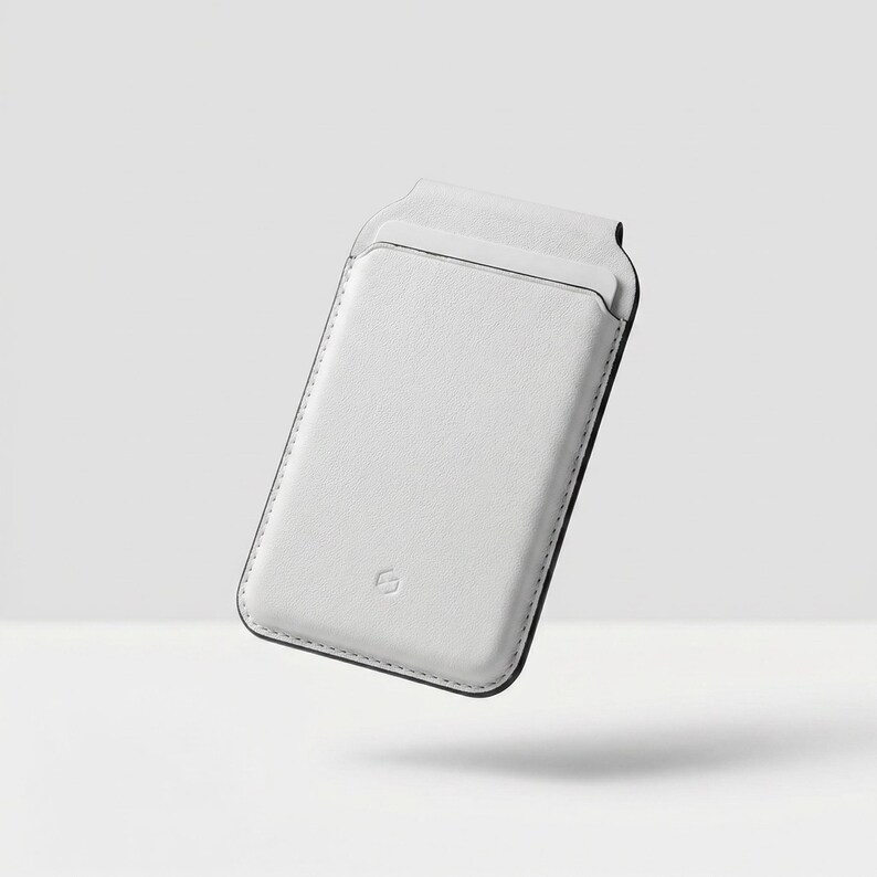 May include: A white leather phone sleeve with black edging. The sleeve features a card pocket and a small logo. The design is minimalist and modern, suitable for carrying a phone and cards.
