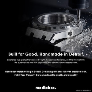May include: A close-up of a watch component being machined. The text "Built for Good. Handmade in Detroit" is visible. The image highlights the precision and craftsmanship of watchmaking.