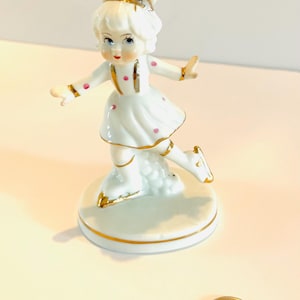 Vintage Porcelain Girl Figure Skating Figurine, 4" Tall