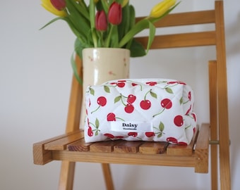 Quilted makeup bag in cotton cherry print with red gingham lining | Aesthetic Toiletry travel cosmetic bags | Handmade in the UK