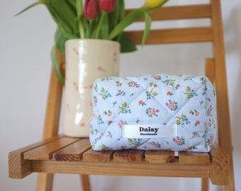 Quilted makeup bag in blue floral with pink gingham check  lining | Aesthetic Toiletry travel cosmetic bags | Handmade in the UK