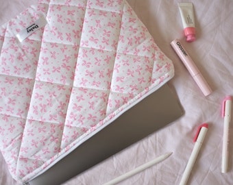 Quilted laptop iPad tablet sleeve in white and pink bow ribbon print with pink cotton lining | Aesthetic laptop case | Handmade in the UK