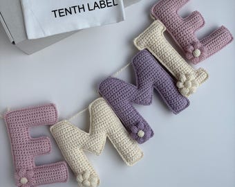 Crochet Name Garland pink and lilac with Flowers: Personalized Nursery Decor
