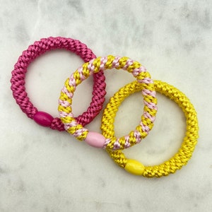 Lot de 3 élastiques à cheveux tressés rose/blanc/jaune, unis et rayés, combinables en bracelet 3er Set Gelb