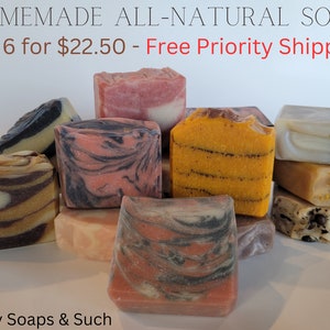 May include: Assortment of handmade, all-natural soap bars in various colors and patterns.  The soap bars are stacked and arranged on a white surface.  The text "HOMEMADE ALL-NATURAL SOAP" and "Pick 6 for $22.50 - Free Priority Shipping!" is visible at the top of the image.  The text "Comfy Soaps & Such" is visible at the bottom of the image.