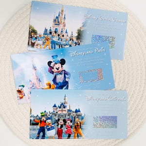 Billet Disneyland |  carte à gratter | Voyage Disney | Gratter et révéler | Disneyland Paris | Révélation des Fêtes | Cadeau voyage d'anniversaire