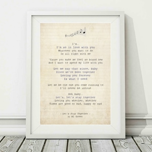 May include: A vintage-style print of the lyrics to the song "Let's Stay Together" by Al Green. The lyrics are printed in a purple font on a cream-colored background with musical notes at the top.