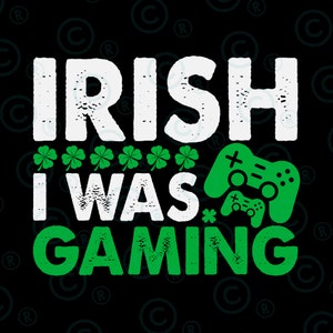 May include: A green and white graphic design with the text "IRISH I WAS GAMING" and two green video game controllers. The text has a distressed look and is surrounded by shamrocks.