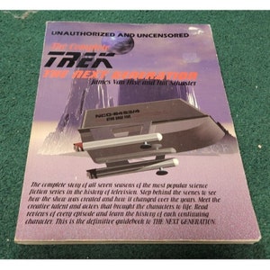 May include: A book cover with a purple and pink background featuring a spaceship with the text "The Complete Trek The Next Generation" and "Unauthorized and Uncensored" on the cover.