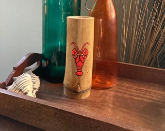 Candelero votivo de langosta de bambú que brilla en la oscuridad