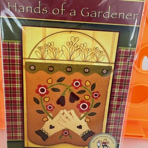 May include: A white ceramic mug with a black handle and the text "But First, Coffee" in a handwritten style. The mug is on a white surface. The mug is approximately 4 inches tall.