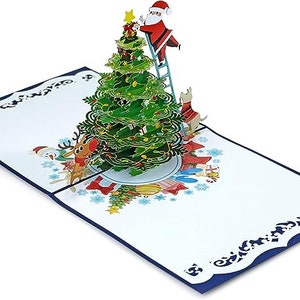 Carte pop-up 3D du Père Noël décorant un sapin de Noël. Une délicieuse carte de voeux surprise pour les enfants, les amis et la famille. 15 cm x 15 cm image 4