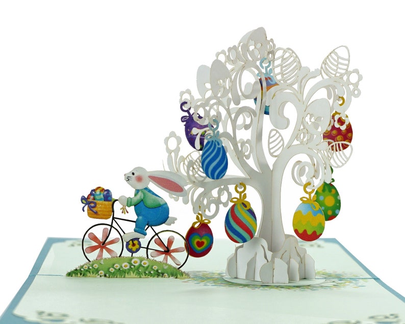 Carte 3D Happy Easter Bunny Bicycle Pop Up. Une délicieuse carte de voeux de Pâques surprise pour les enfants, les enfants, la famille et les amis. 15 cm x 15 cm image 1
