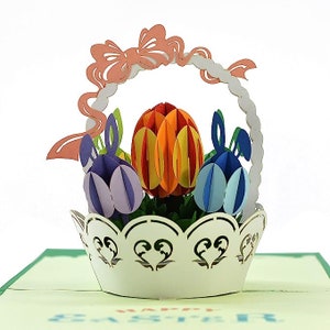 Tarjeta 3D desplegable con forma de cesta de conejito de Pascua. Un regalo de felicitación de Pascua sorpresa y encantador para niños, familiares y amigos. 15 cm x 15 cm