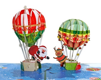 Carte pop-up 3D Santa Reindeer Air Balloons. Ravissante carte pour les enfants, les amis, la famille et les proches. Décoration de Noël et fêtes. 15 cm x 15 cm