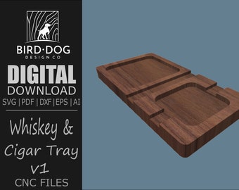 Puede incluir: Una bandeja de madera para whisky y puros con dos compartimentos. La bandeja está hecha de madera oscura con un patrón de veta natural. La bandeja está diseñada para contener un vaso de whisky y un puro.