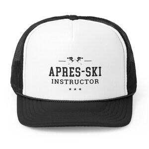 May include: A white and black trucker hat with the text "APRES-SKI INSTRUCTOR" and a graphic of two skiers crossing skis.