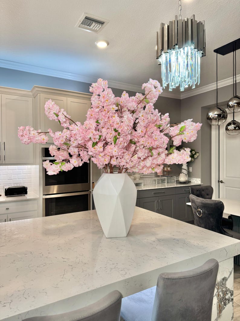 3.5 foot silk flowers

Aria cherry blossom branches

realistic silk cherry blossoms

pink blossom branches for vase

tall artificial flower stems

cherry blossoms for floor vase

table centerpiece cherry blossoms

wedding cherry blossom decor

home