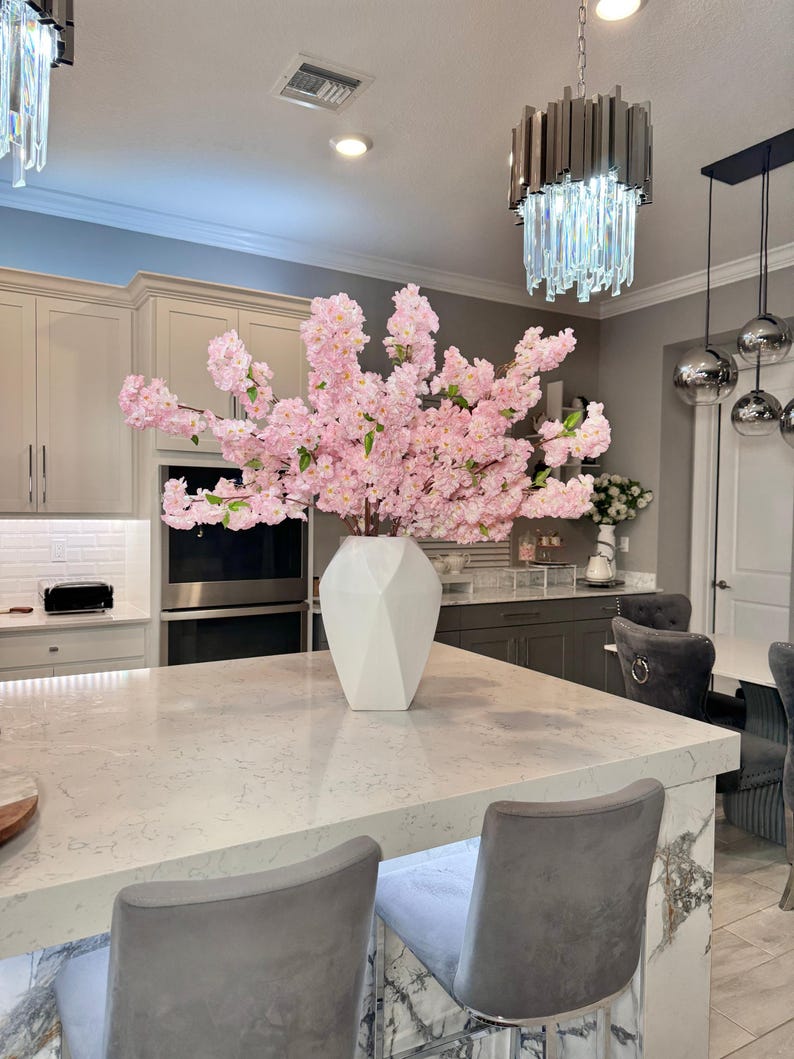 3.5 foot silk flowers

Aria cherry blossom branches

realistic silk cherry blossoms

pink blossom branches for vase

tall artificial flower stems

cherry blossoms for floor vase

table centerpiece cherry blossoms

wedding cherry blossom decor

home