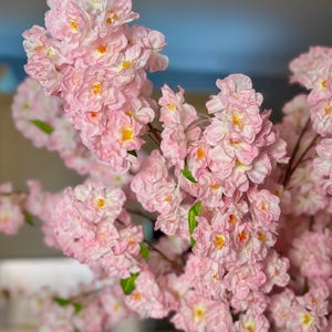 office decor artificial branches

spring home decor branches

baby shower pink decorations

event decor cherry blossoms

vase filler branches

lush floral arrangement

decorative branches for living room

bedroom decor pink flowers

everlasting