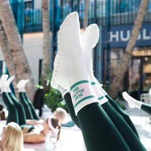 In my Pilates retro pink and green cream non slip grip sock with heart grips for Pilates, barre, yoga or lagree image 2