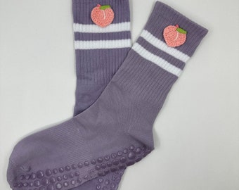 Purple striped grip socks for Pilates, yoga or barre