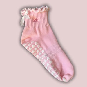 Light pink ruffle bow custom embroidered initial non slip grip socks for Pilates, Yoga, Lagree or Barre with white heart grips