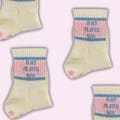 In my Pilates era retro cream colored pink and light blue non slip grip sock with pink star grips for pilates, barre, yoga or lagree