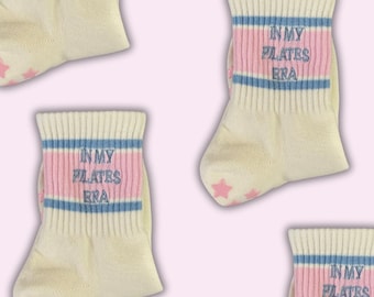 In my Pilates era retro cream colored pink and light blue non slip grip sock with pink star grips for pilates, barre, yoga or lagree