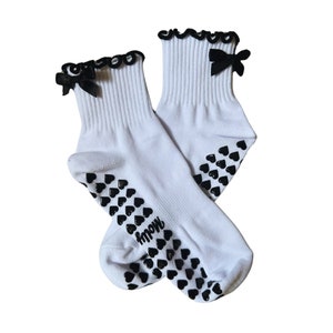 Black & White bow grip socks with heart grips for Pilates, Yoga, Barre or Lagree with black heart grips